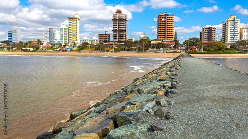 praia e os prédios e o molhe em Balneário Piçarras, Santa Catarina, Brasil ao fundo a Ilha feia photo