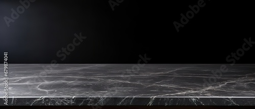 Empty table marble black countertop on black wall background. High quality photo photo