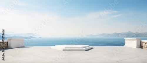 White marble podium with sea view on background