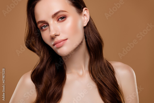 Portrait of pretty charming lady enjoying new cream lotion for pure perfect skin on pastel color background