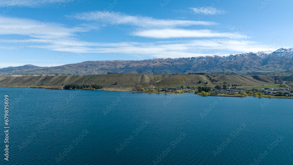 Panoramic aerial droneviews of Lake Dunstan and its mountainous shoreline in central Otago