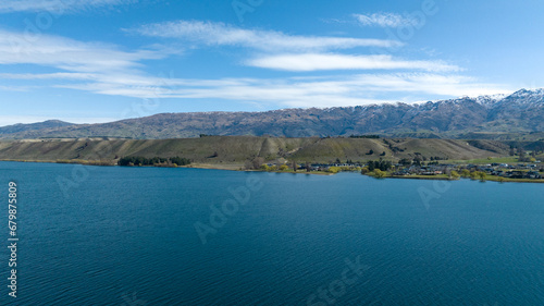 Panoramic aerial droneviews of Lake Dunstan and its mountainous shoreline in central Otago