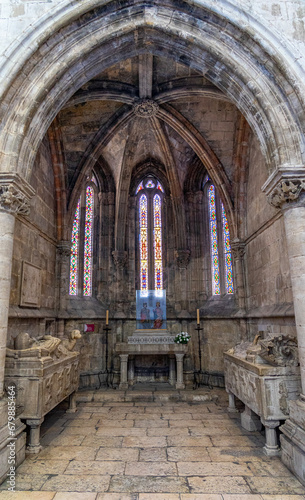 Chapel of S  o Cosimo and S  o Dami  o with the statue in the center in the Lisbon Cathedral.