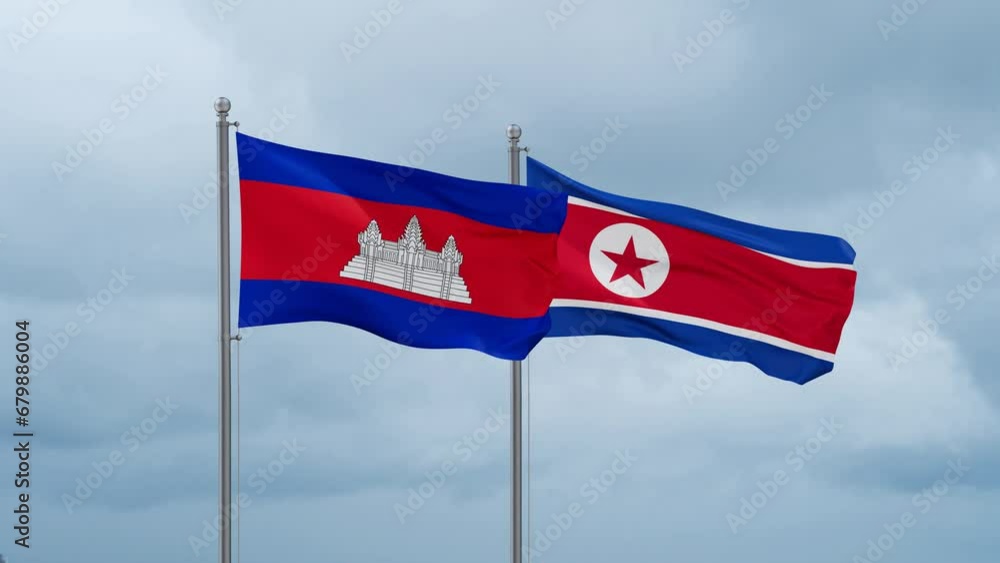 North Korea and Cambodia flag waving together on cloudy sky, endless seamless loop North Korea and Cambodia flag waving together on cloudy sky, endless seamless loop
