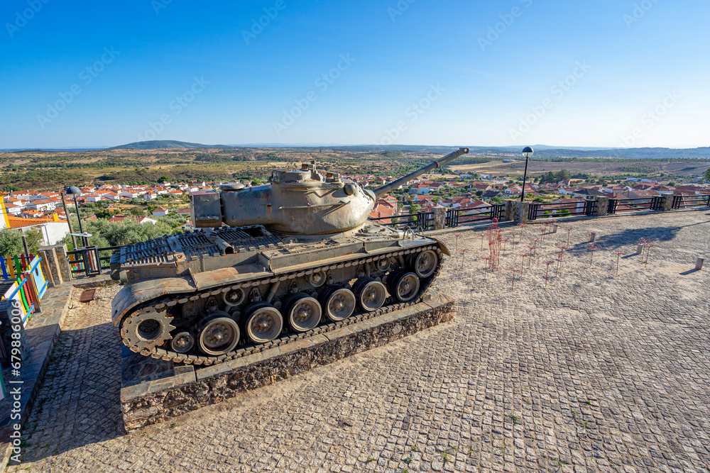 battle tank on display in the Portuguese village of Penha Garcia in honor of the soldiers and military of the war battle tank on display in the Portuguese village of Penha Garcia in honor of the soldiers and military of the war