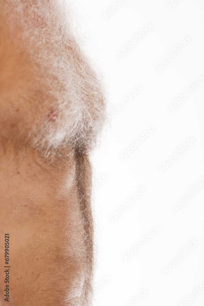 Time's imprint across the elder's chest