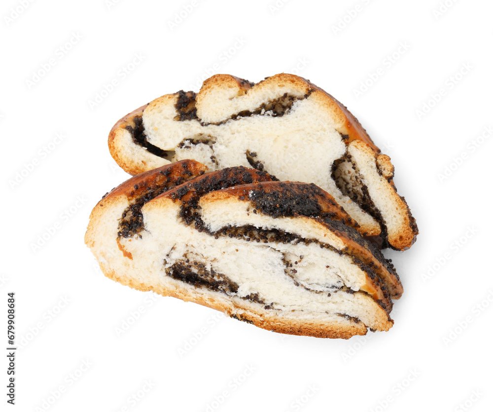 Slices of poppy seed roll isolated on white, above view. Tasty cake