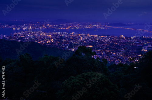 Aerial panorama cityscape of Georgetown, the capital city of Penang state Malaysia, night scene view. photo