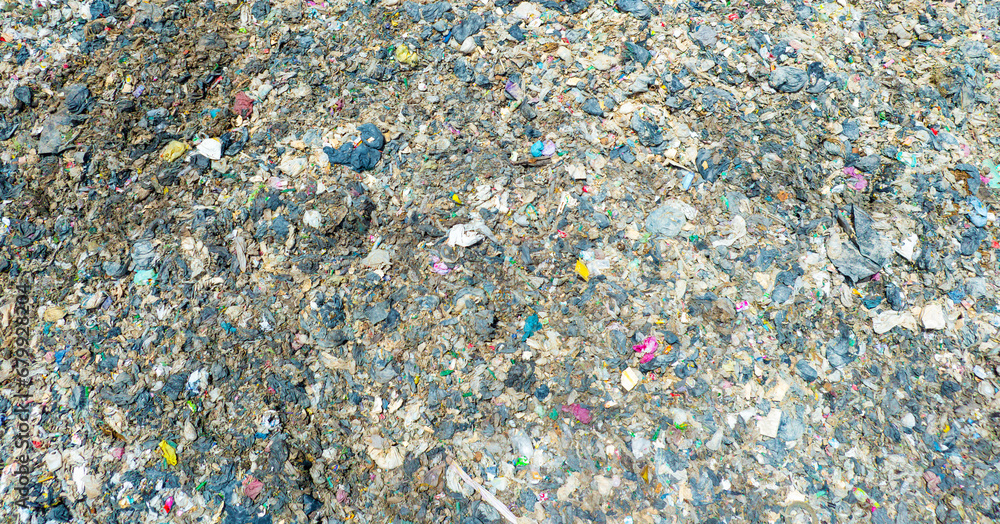 Aerial view, piles of garbage, plastic bottles and garbage. waste sorting facility Concept of waste disposal and waste separation to preserve the environment and save the world. Aerial view, piles of garbage, plastic bottles and garbage. waste sorting facility Concept of waste disposal and waste separation to preserve the environment and save the world.