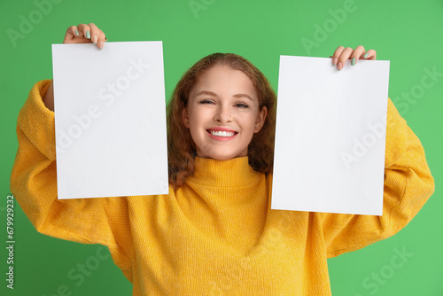 Young woman with blank pape...