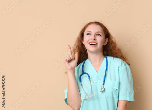 Female doctor pointing at s...