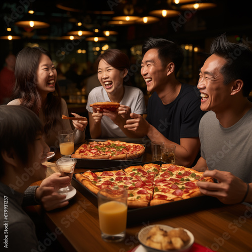 group of people eat pizza in the restaurant 