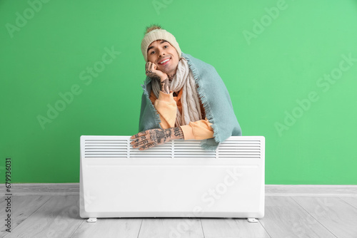 Young man in winter clothes...