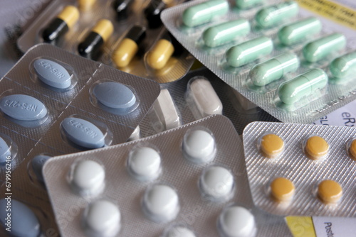 A pile of tablets and pills.