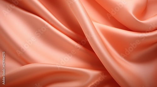 Closeup of rippled orange satin fabric texture background.