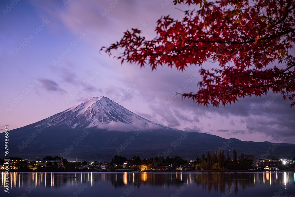 Mount Fuji and maple leaves in the autumn season at Lake Kawaguchiko, Japan.