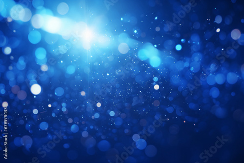 Bright blue bokeh lights abstract background, flying particles or dust texture special effect concept illustration