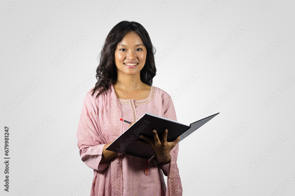 Indian and Nepali Asian Girl on Kurthi giving student gestures and other hand gestures Indian and Nepali Asian Girl on Kurthi giving student gestures and other hand gestures