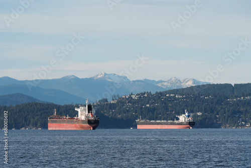 Ship in front of the coast of Vancouver as seen from Jericho Beach in British Columbia, Canada photo