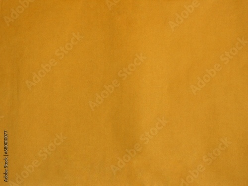 For the design background brown corrugated cardboard texture background. Brown paper cardboard with soft color. Brown corrugated cardboard texture is useful as a background.