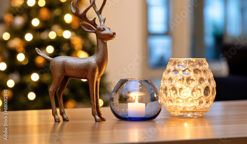 Christmas decorations in a living room with candle.