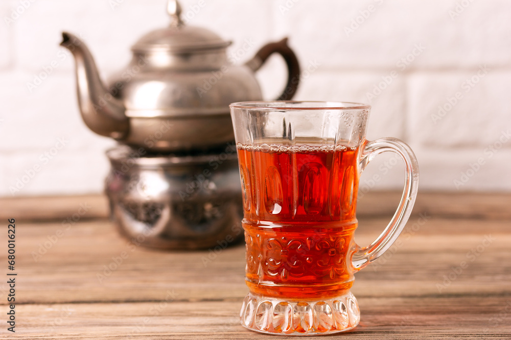 Turkish teapot and glass of tea. Turkish teapot and glass of tea.