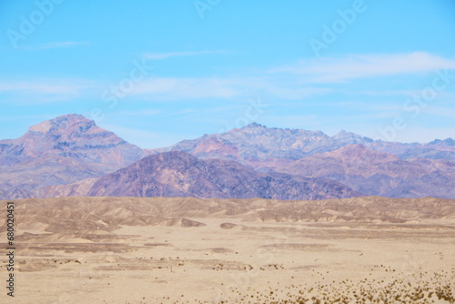 Out of focus. Blurred background of the silhouette of mountains on a hot day.