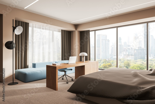 Beige home bedroom interior with workplace, bed and couch near window