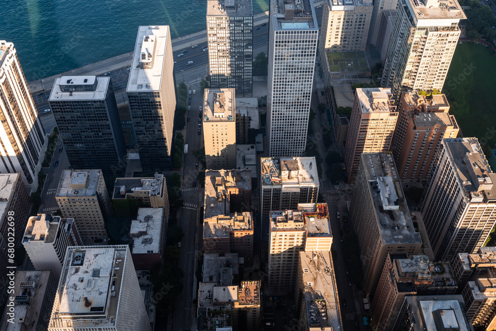 Top aerial view of Chicago city skyscrapers near lake Michigan