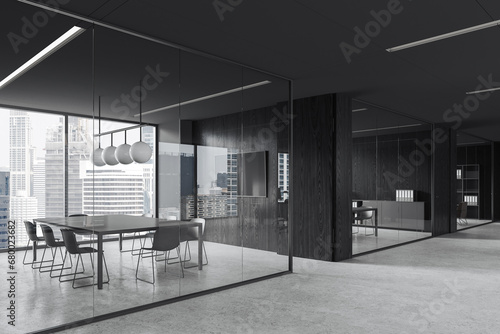 Black glass office room interior with table and chairs, tv display and window