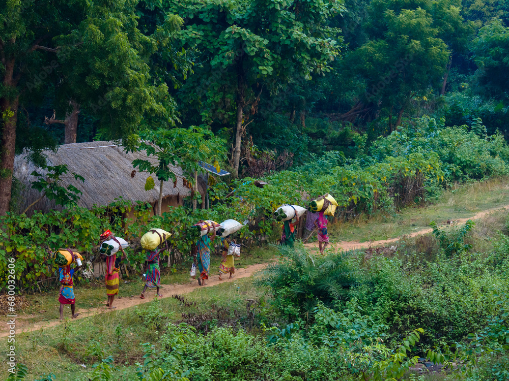 Indian Rural women , returning home after a long day Hard work. Indian Rural women , returning home after a long day Hard work.