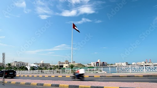 United Arab Emirates Flag Hoisted in Sharjah Flag Island photo