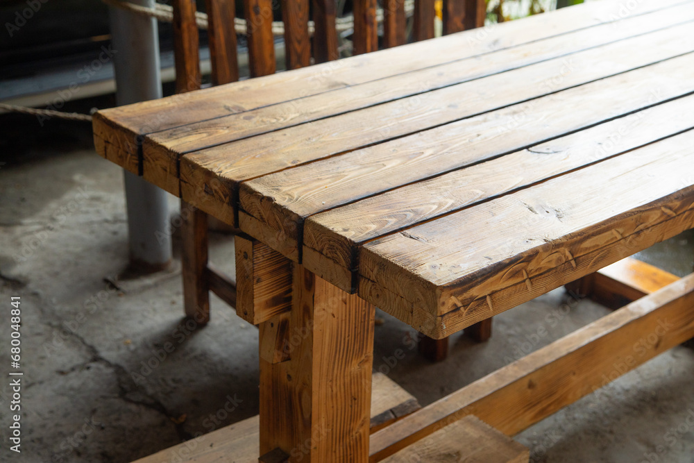 Wooden table at home. Natural wooden table Wooden table at home. Natural wooden table