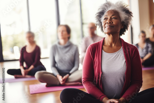 Diverse Senior Women Meditating Together In Yoga Class. Сoncept Yoga For Seniors, Mindfulness Meditation, Wellness For Older Adults, Active Aging, Unified Senior Yoga Class