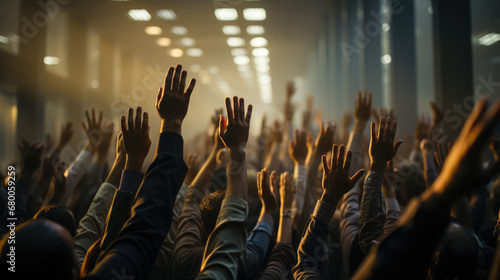 Every employee in the office raised their hands and stuck them in the air