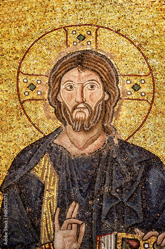 Hagia Sophia, Detail of the Empress Zoe mural mosaic representing the Christ Pantocrator, the Empress Zoe and Constantine IX Monomakhos, Istanbul, Turkey photo