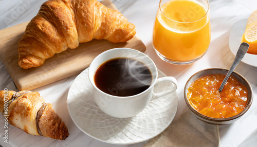 Breakfast with croissant and coffee