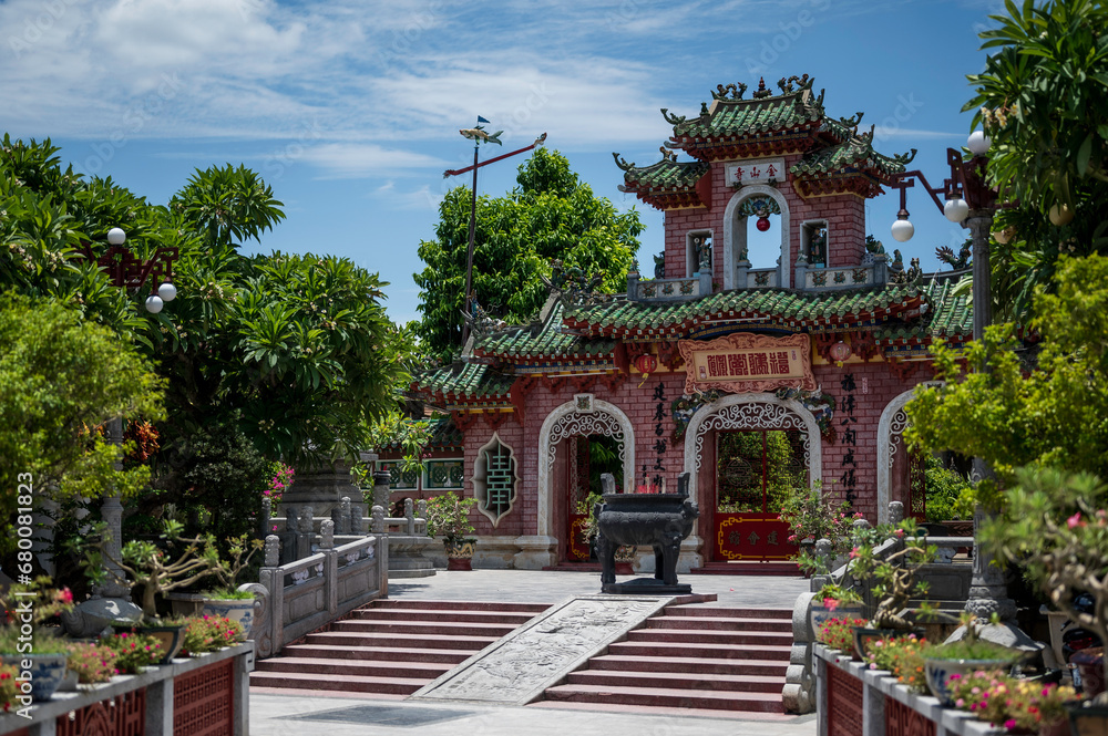 An ancient facade of a religious temple, in south east Asia.  The busilding is located in Hoi An, central Vietnam