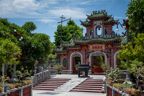An ancient facade of a religious temple, in south east Asia. The busilding is located in Hoi An, central Vietnam