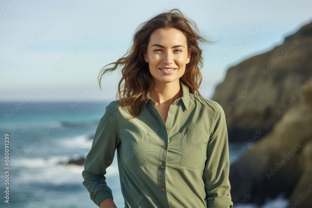 Portrait of a tender woman in her 30s sporting a breathable hiking shirt against a tranquil ocean backdrop. AI Generation Portrait of a tender woman in her 30s sporting a breathable hiking shirt against a tranquil ocean backdrop. AI Generation