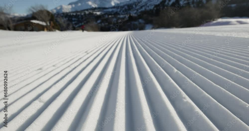 Straight line rows of freshly prepared groomed ski slope piste. Close-up shot Straight line rows of freshly prepared groomed ski slope piste. Close-up shot