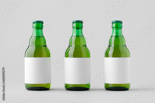 Green steinie beer bottle mockup with blank label. photo