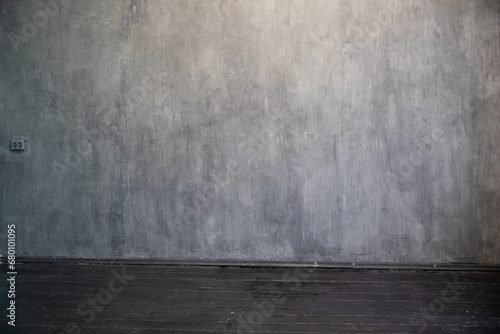 Gray wall in a dark room texture as a background