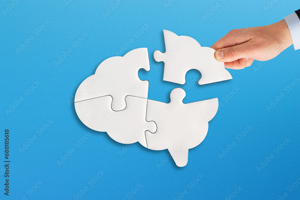 Brain shaped jigsaw puzzle.Missing piece of the brain puzzle. Mental health and problems with memory.