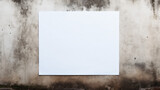 White poster on concrete wall. or blank paper labels