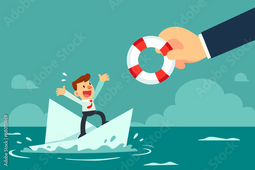 helping hand give lifebuoy to businessman on sinking paper boat