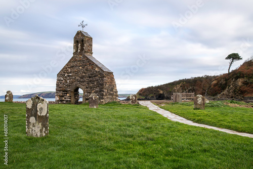 The bay of Cwm Yr Eglwys on the Pembrokeshire coast in Wales photo