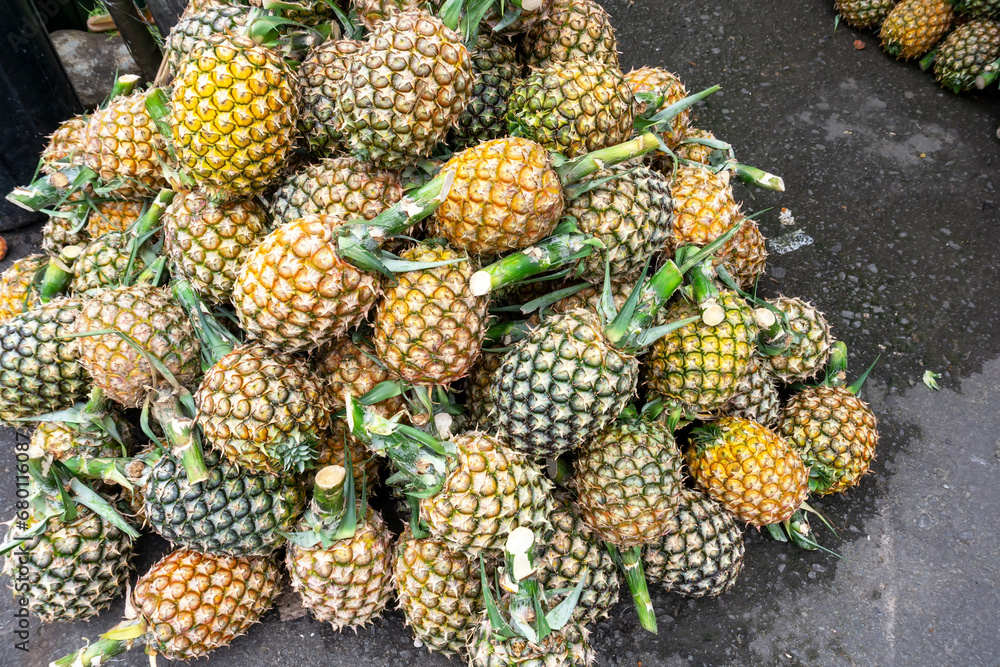 Heap of pineapple for sell in the market Heap of pineapple for sell in the market