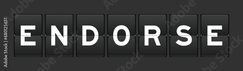 Black color analog flip board with word endorse on gray background
