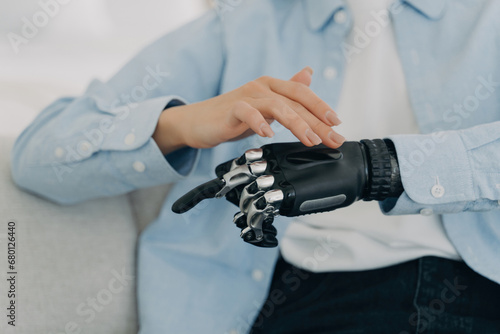 Human touch meets technological innovation with a robotic prosthetic hand photo